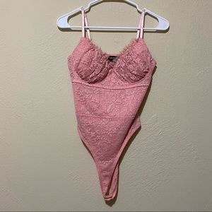 Pink body suit